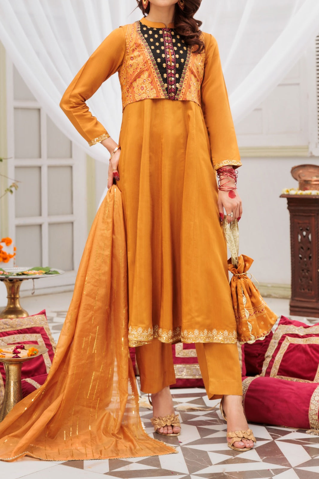 Mustard embroidered frock with screen printing and tilla work