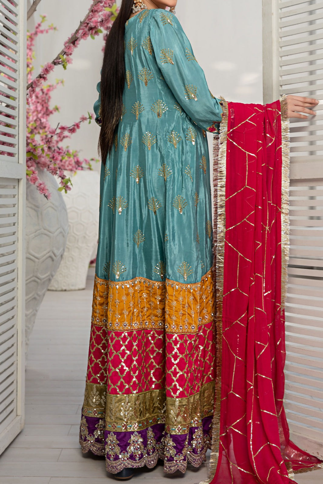 Blue embroidered base long maxi with multi coloured border embellished with sequins with chiffon dupatta edged with intricate tilla lace