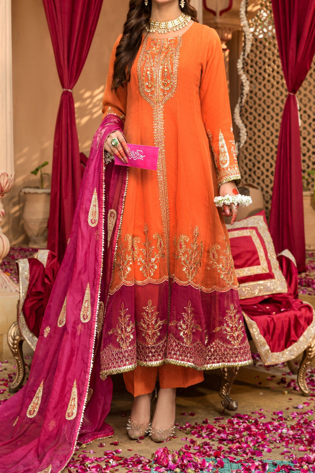 Orange frock with embroidery and mirror work neckline and viscose trouser and silk organza dupatta