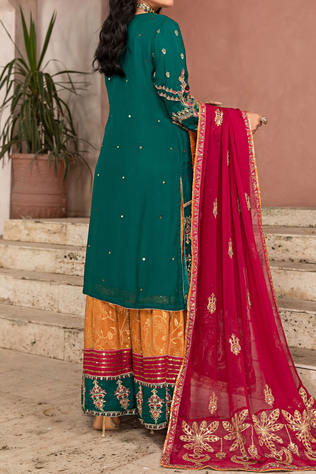 Green chiffon shirt with multi-coloured sharara, embroidered with screen printing and embellished with sequins, paired with chiffon embroidered dupatta and viscose sharara