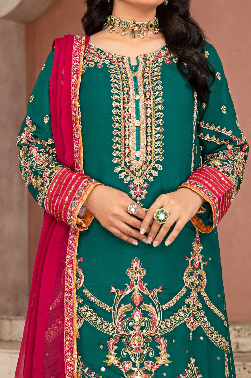 Green chiffon shirt with multi-coloured sharara, embroidered with screen printing and embellished with sequins, paired with chiffon embroidered dupatta and viscose sharara