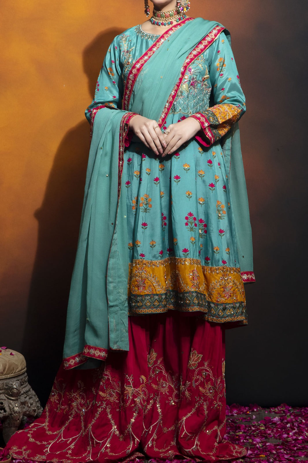 Blue Viscose screen printed embellished frock with red embroidered Sharara pairs with chiffon dupatta