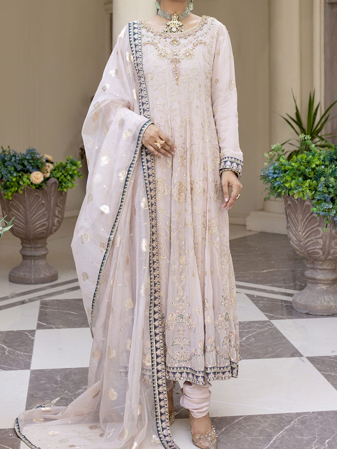 Light Pink embroidered and embellished Chiffon long frock with Viscose Churidaar pairs with embroidered organza dupatta with embellished border